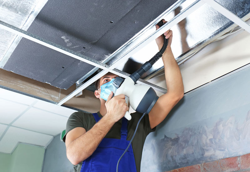 Man Installing Air Quality System